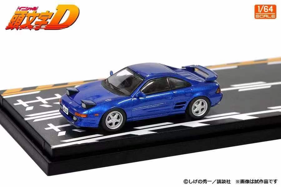 Modelers 1/64 Initial D Japanese Comic Anime Special Edition with Background Toyota Sprinter Trueno AE86 White & Toyota MR2 SW20 Blue - 2 Cars Set