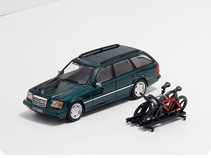 Mortal 1:64 Mercedes Benz E Class S124 Estate Green Original Silver Wheels Version with Roof Cage and Bicycles Limited 499 Pieces